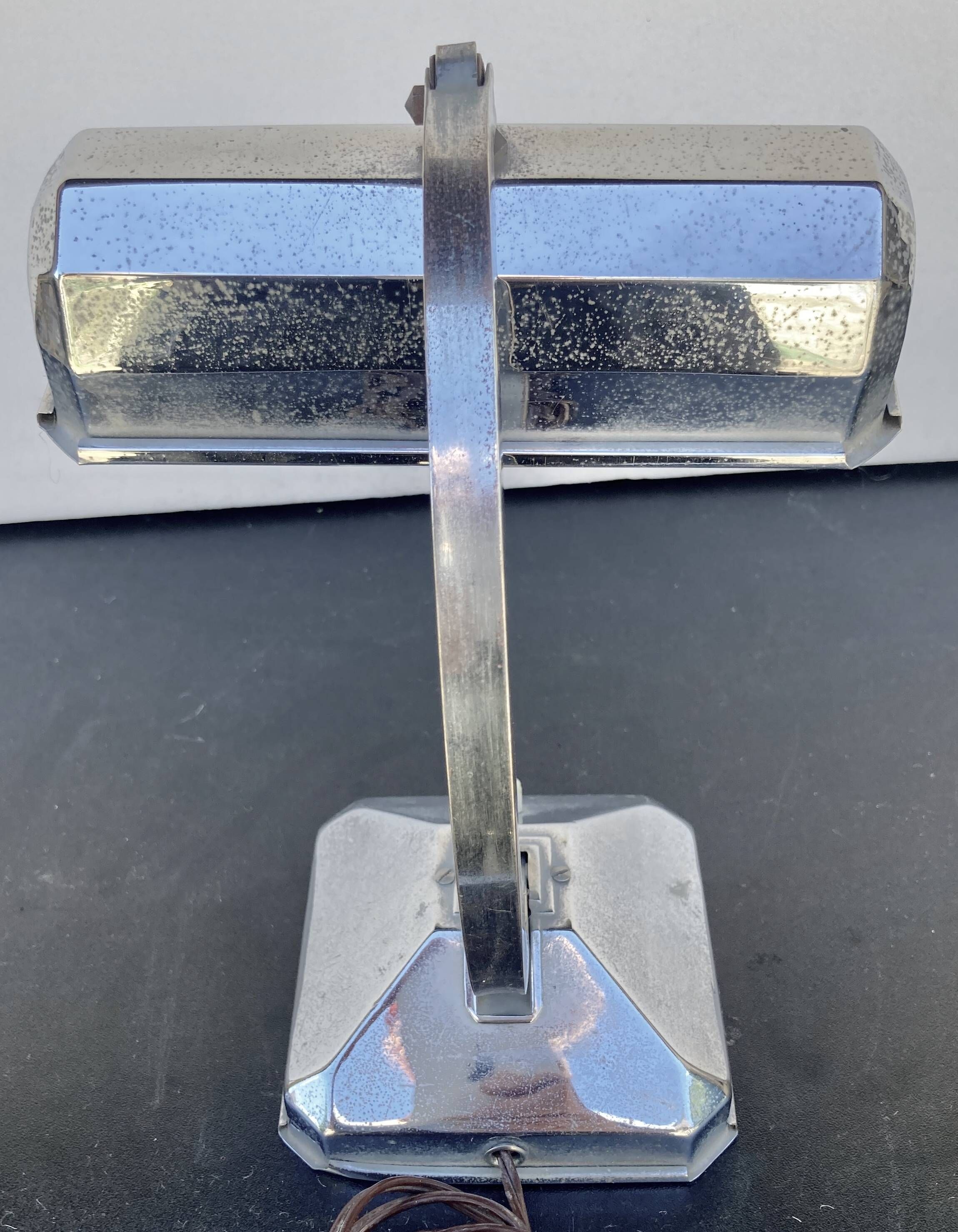 Small Pirouett Art Deco lamp with a chrome base.