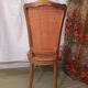 Caned chair in Louis XV style painted orange.