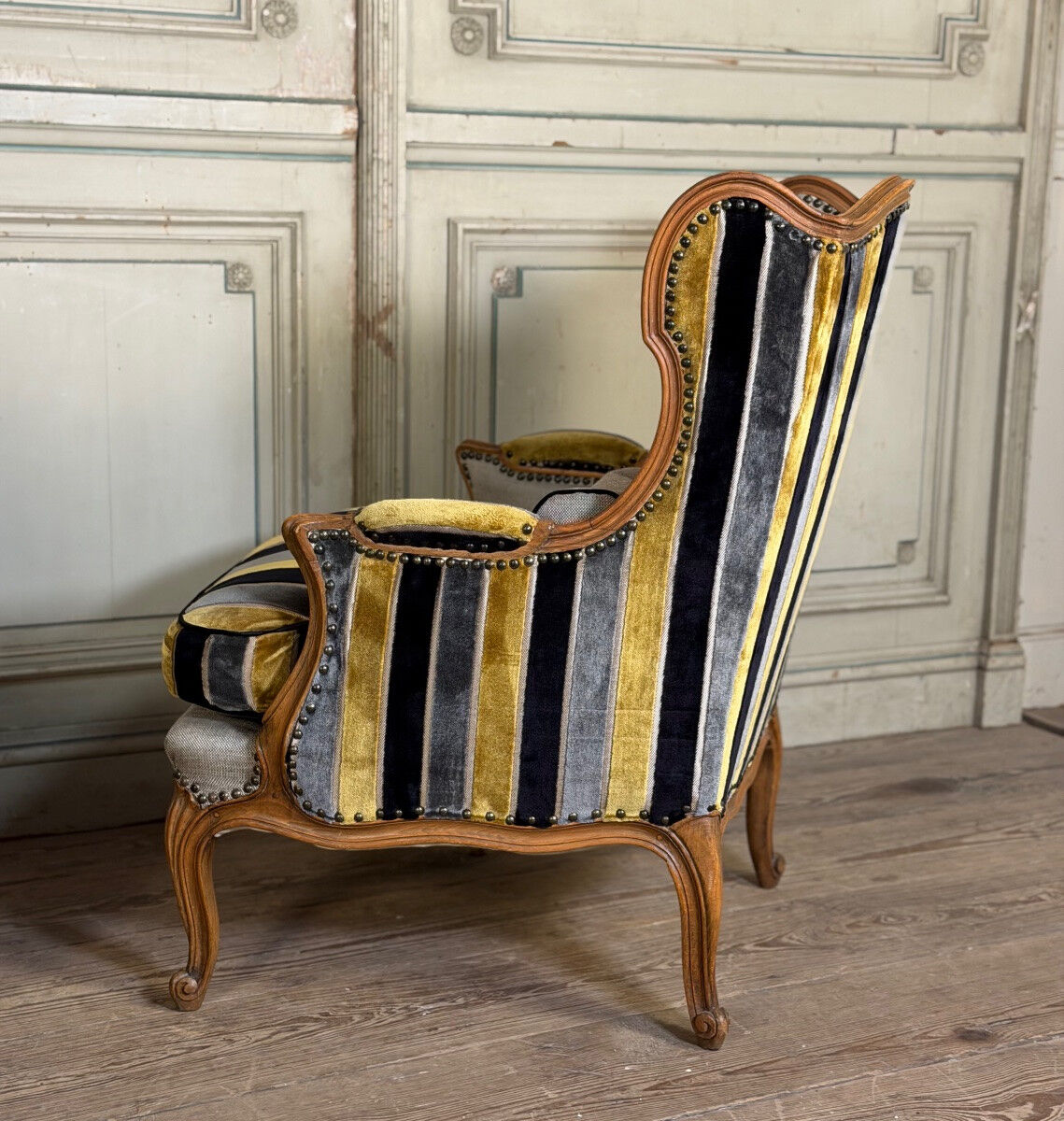 Pair of carved wooden armchairs, 20th century