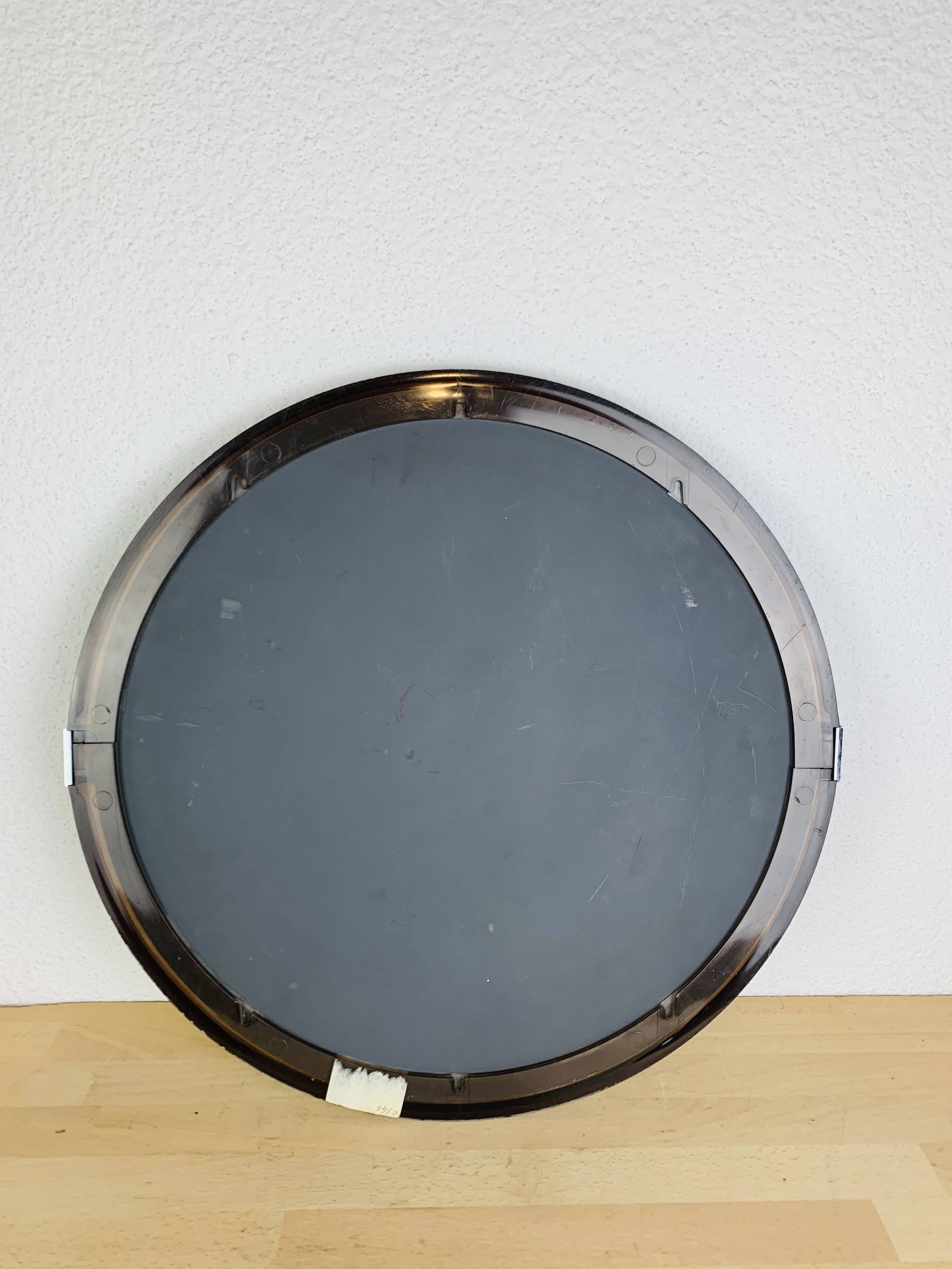 Miroir rond cerclage ambré années 70 vintage