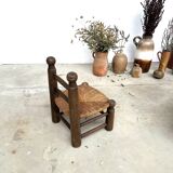 Brutalist chair in wood and straw