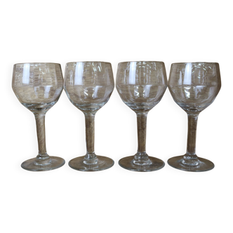 4 old aperitif glasses with transparent stem and faceted relief from the 50s and 60s