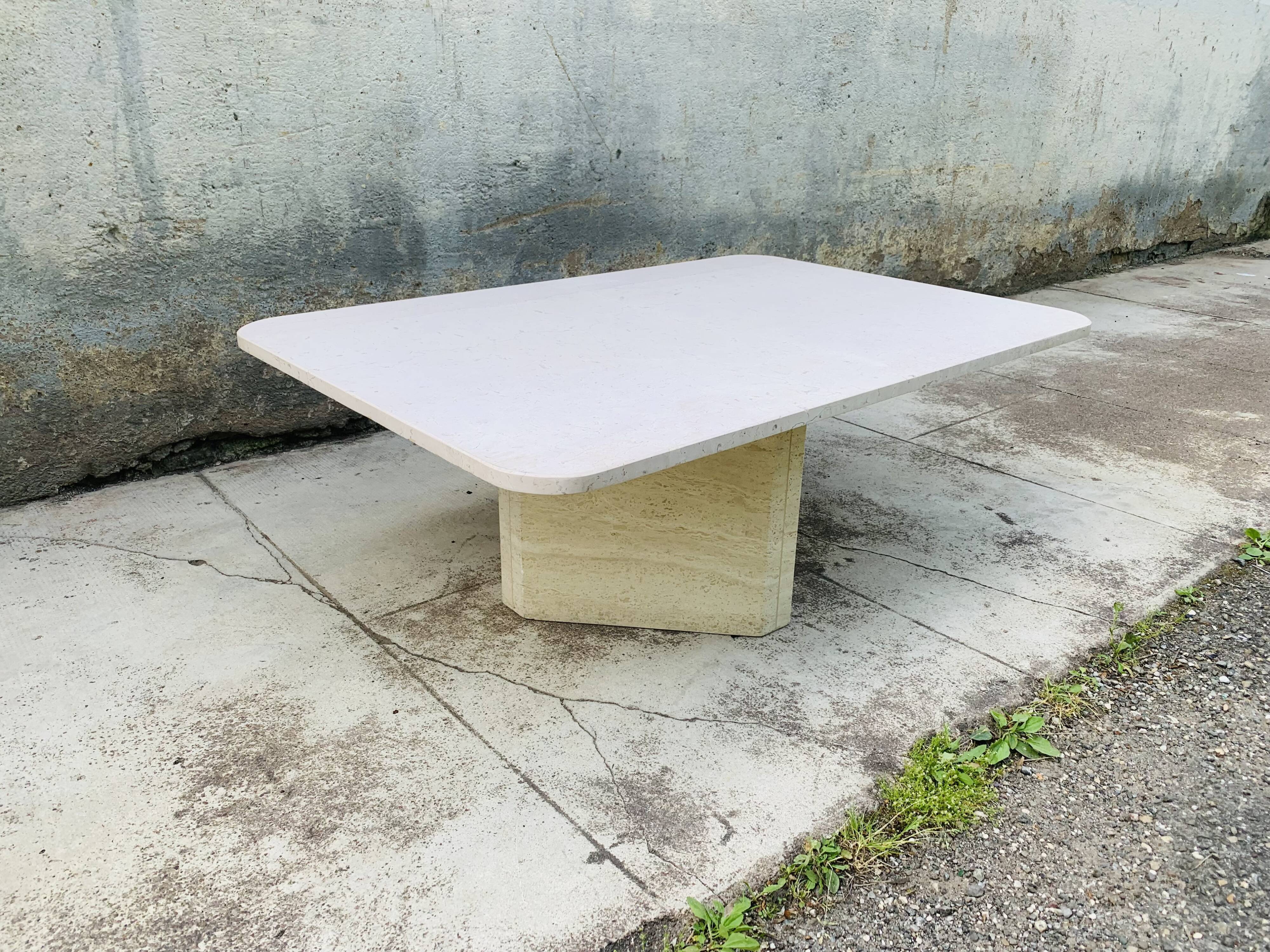 Rectangular travertine coffee table central foot