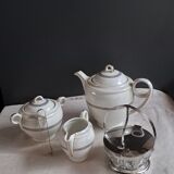 Teapot, sugar bowl, milk jug, jam jar.