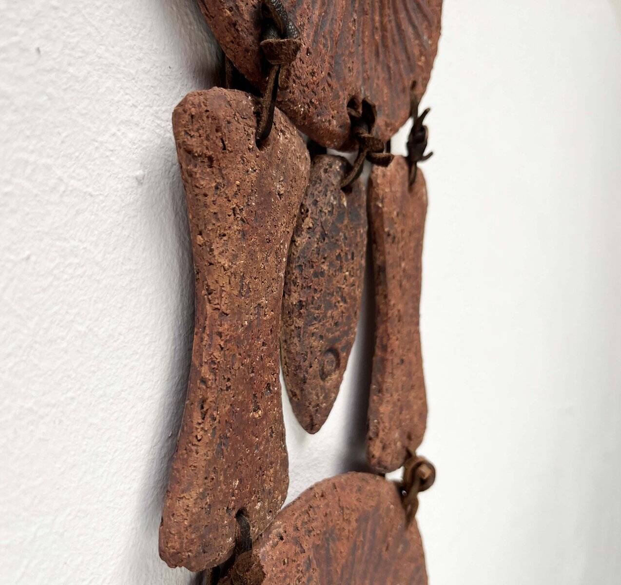 Wall suspension of Danish studio pottery in mid-century brutalist modernist style by Clara Helmich, 1979.