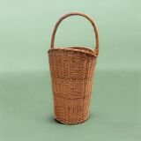 Old woven wicker umbrella stand