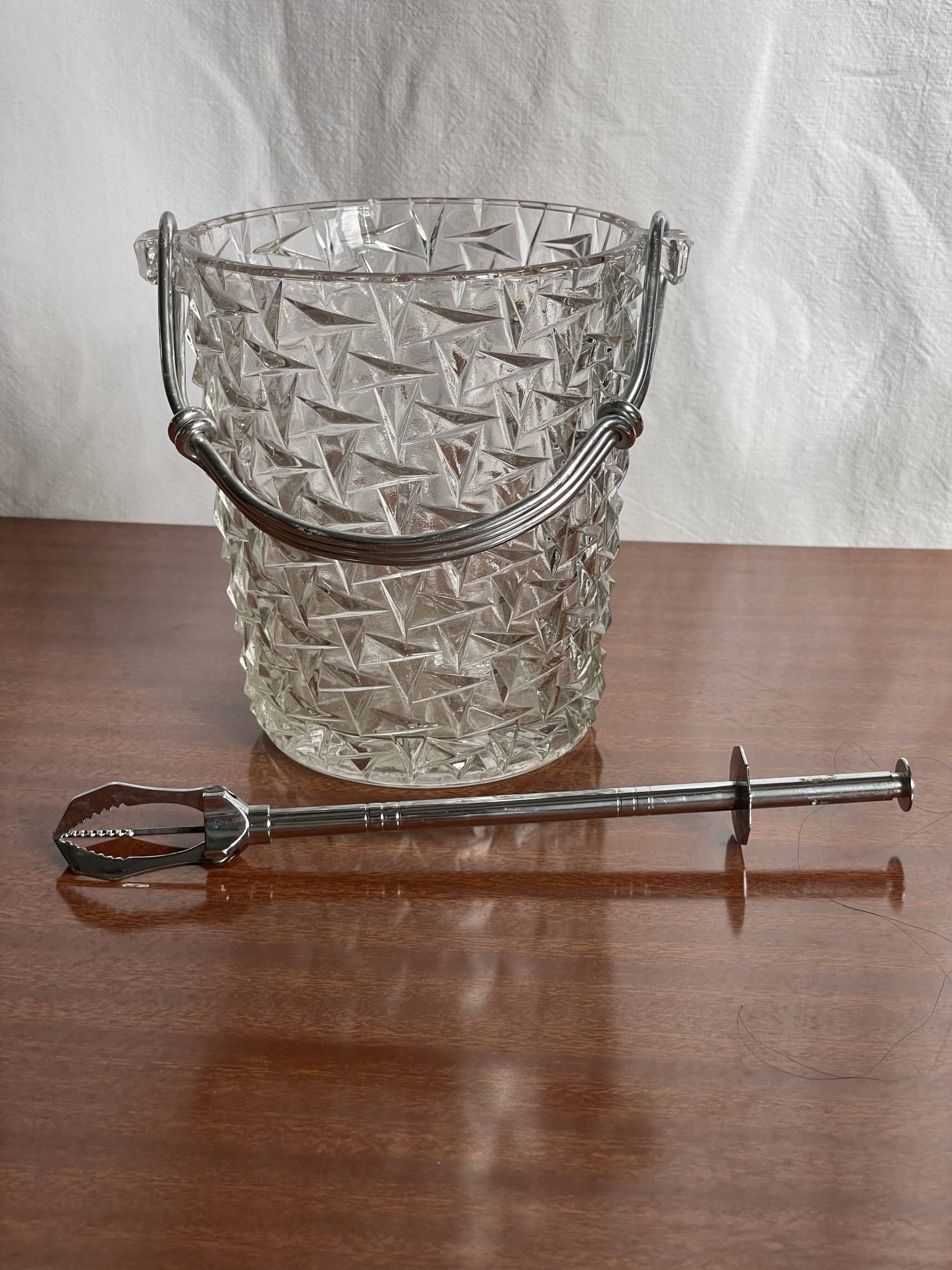 Vintage chiseled glass ice bucket with pliers