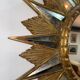 Golden sunburst mirror with wooden rays - 1950s