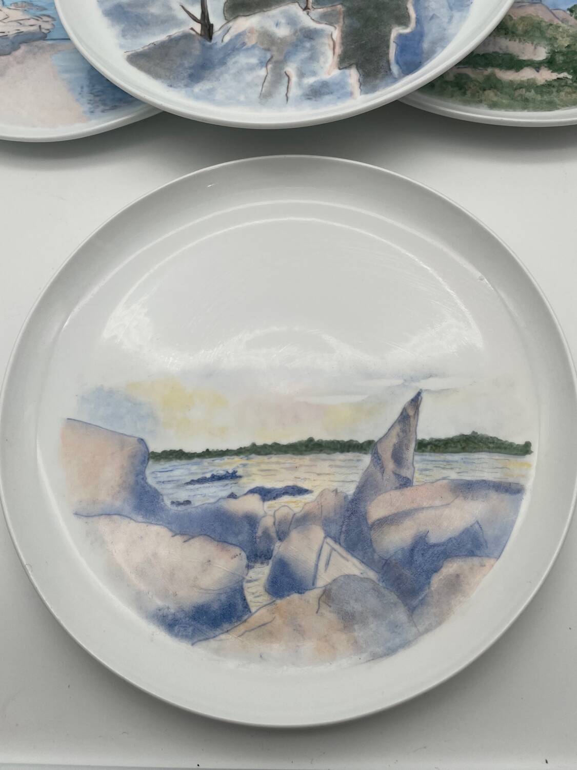 Hand painted porcelain plate with landscape decoration
