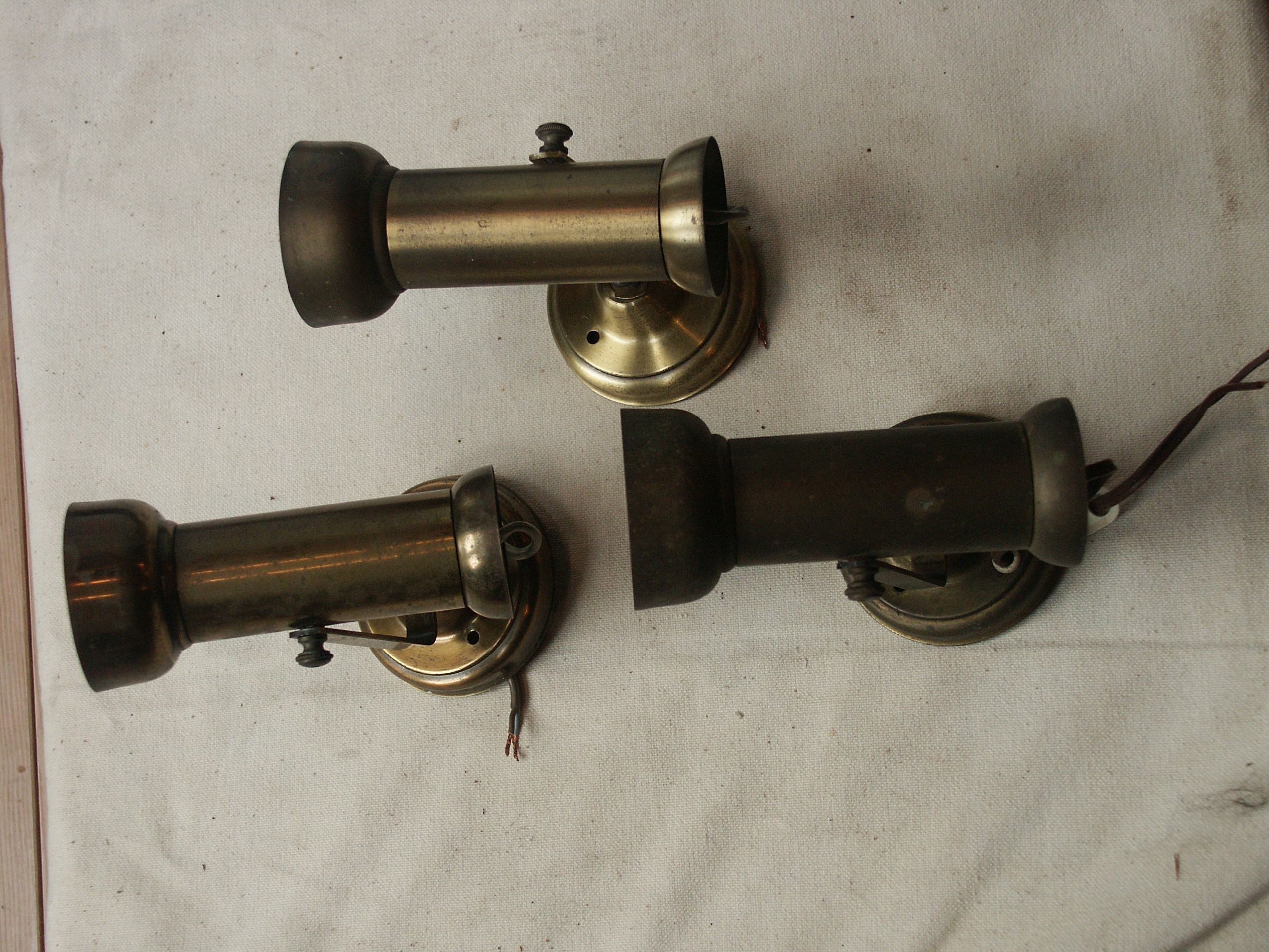 Trio of brass spots year 70