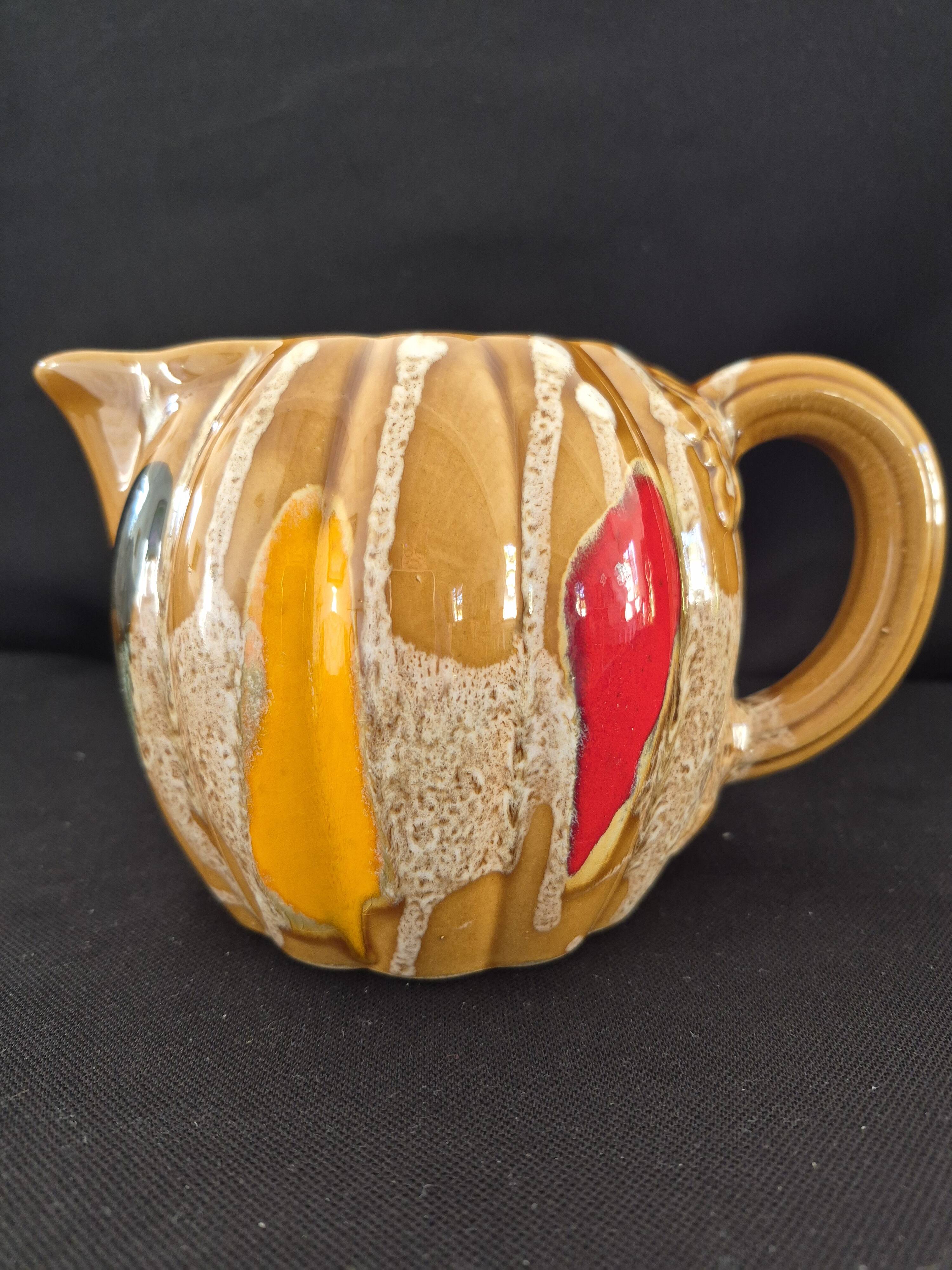 Melon-shaped ceramic jug, signed Poët-Laval, Cavaillon.