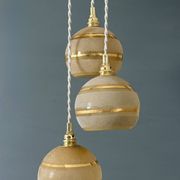 Suspension triple vintage glass globes in frosted yellow and gold.