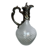 Glass decanter and silver metal frame