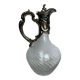 Glass decanter and silver metal frame