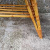 Rattan coffee table with compass legs