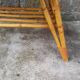 Rattan coffee table with compass legs