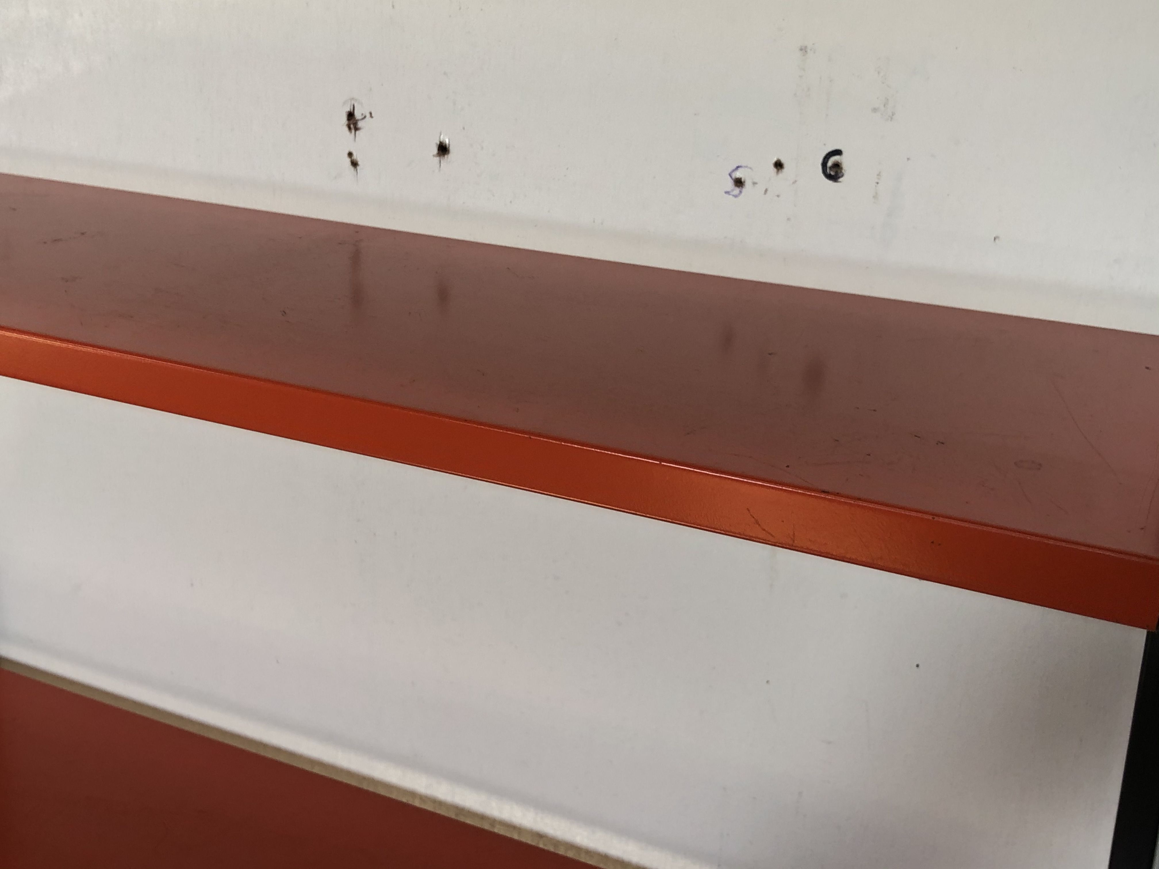 Tomado Holland vintage wall support black steel orange from the 1970s