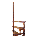 Spiral staircase for library made of mahogany wood