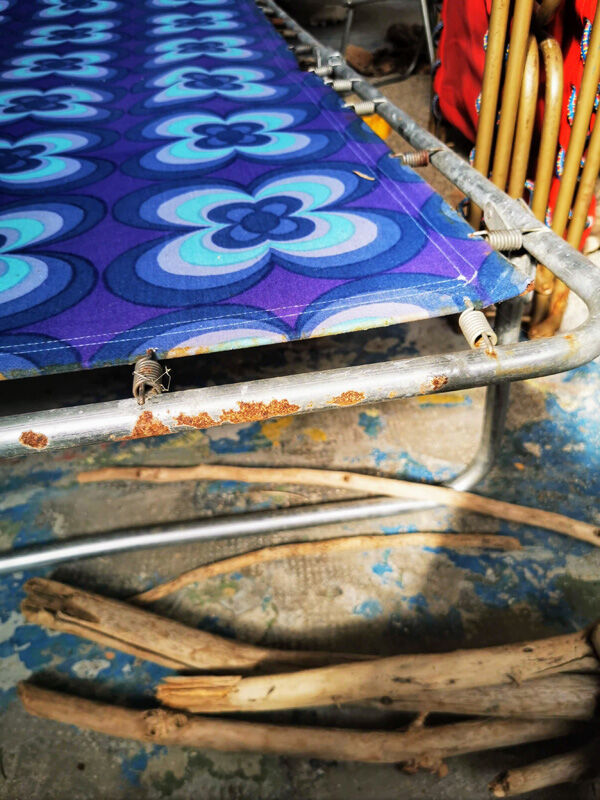 Camp bed or vintage sunbathing