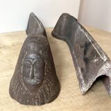Pair of modernist anthropomorphic fireplace andirons, brutalist log holders 1950s