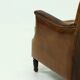 Fauteuil en cuir de mouton patiné années 1950