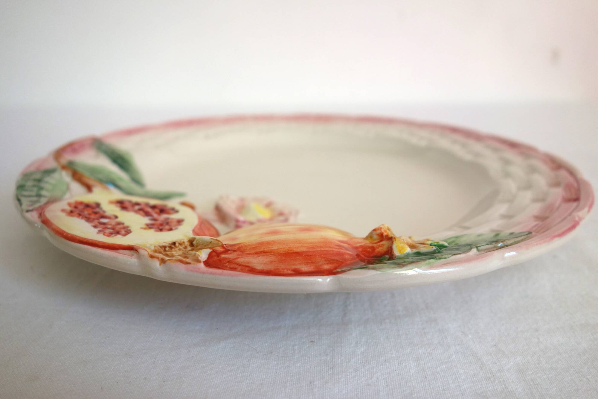 2 vintage pomegranate slip plates signed Francesco Guarino