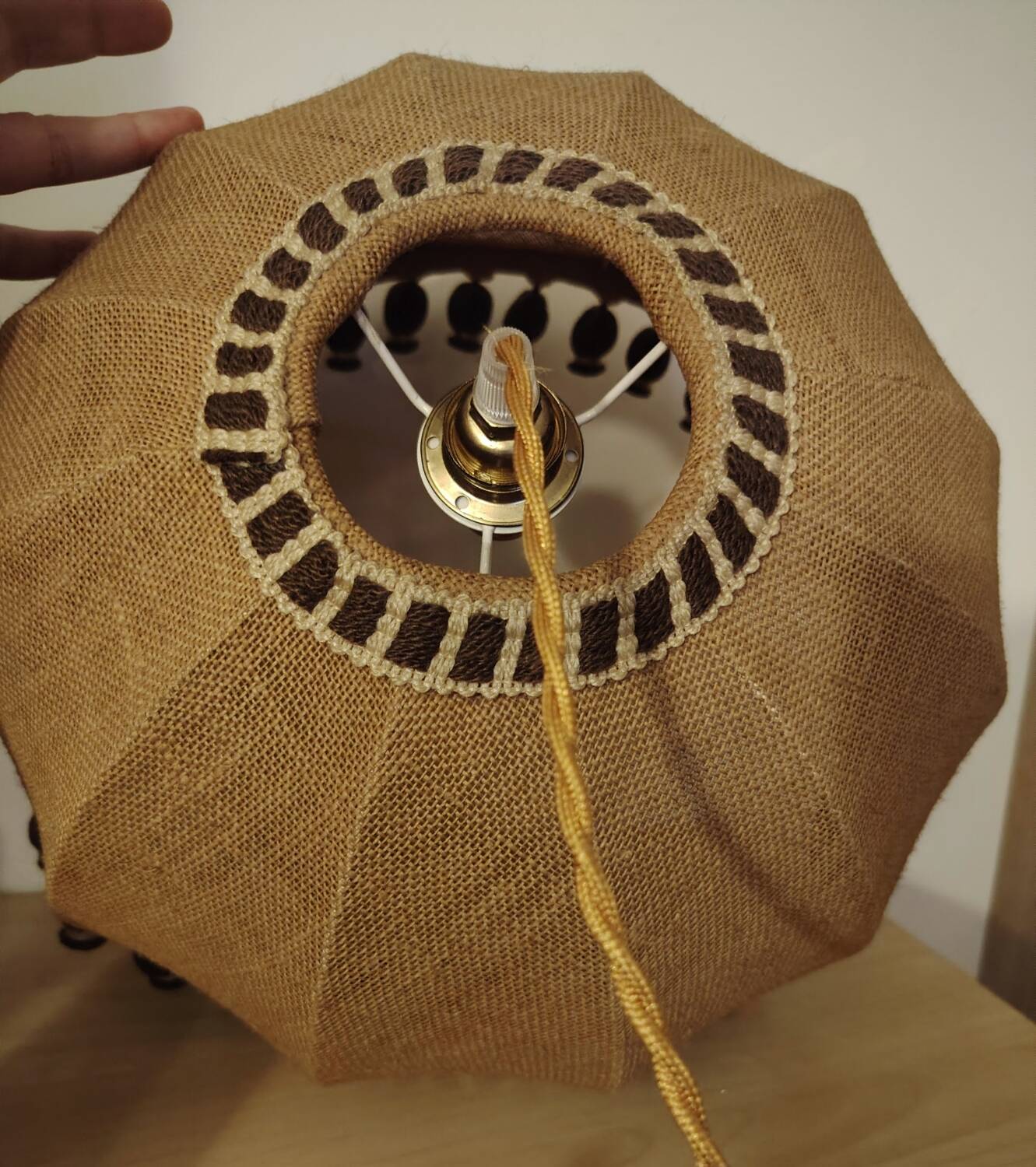 Large hanging pendant light with a burlap and pom-pom style