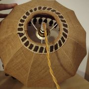 Large hanging pendant light with a burlap and pom-pom style