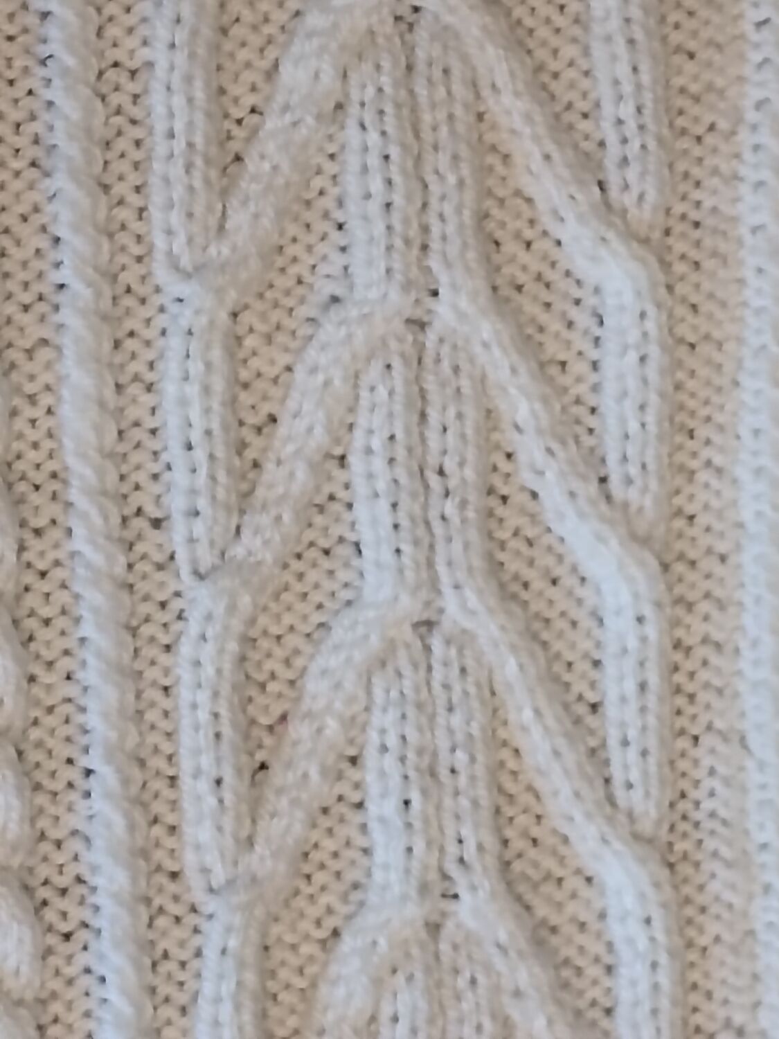 Hand-knitted wool blanket or plaid