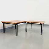 Suite of two vintage modernist Isa coffee tables in teak and black metal from the 60s