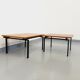 Suite of two vintage modernist Isa coffee tables in teak and black metal from the 60s