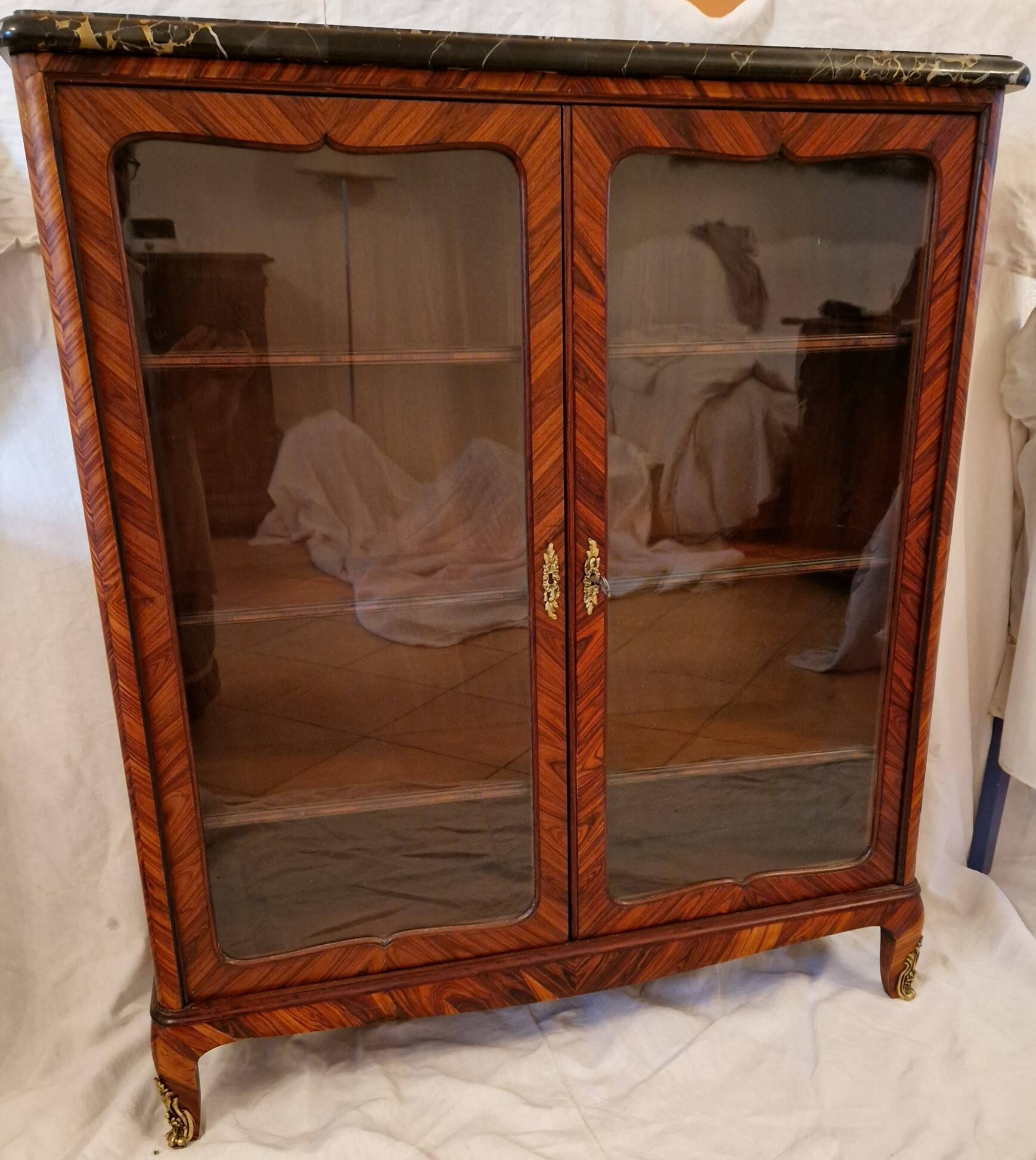 Napoleon III display cabinet in marquetry, Louis XV style, black marble, gilded bronze.