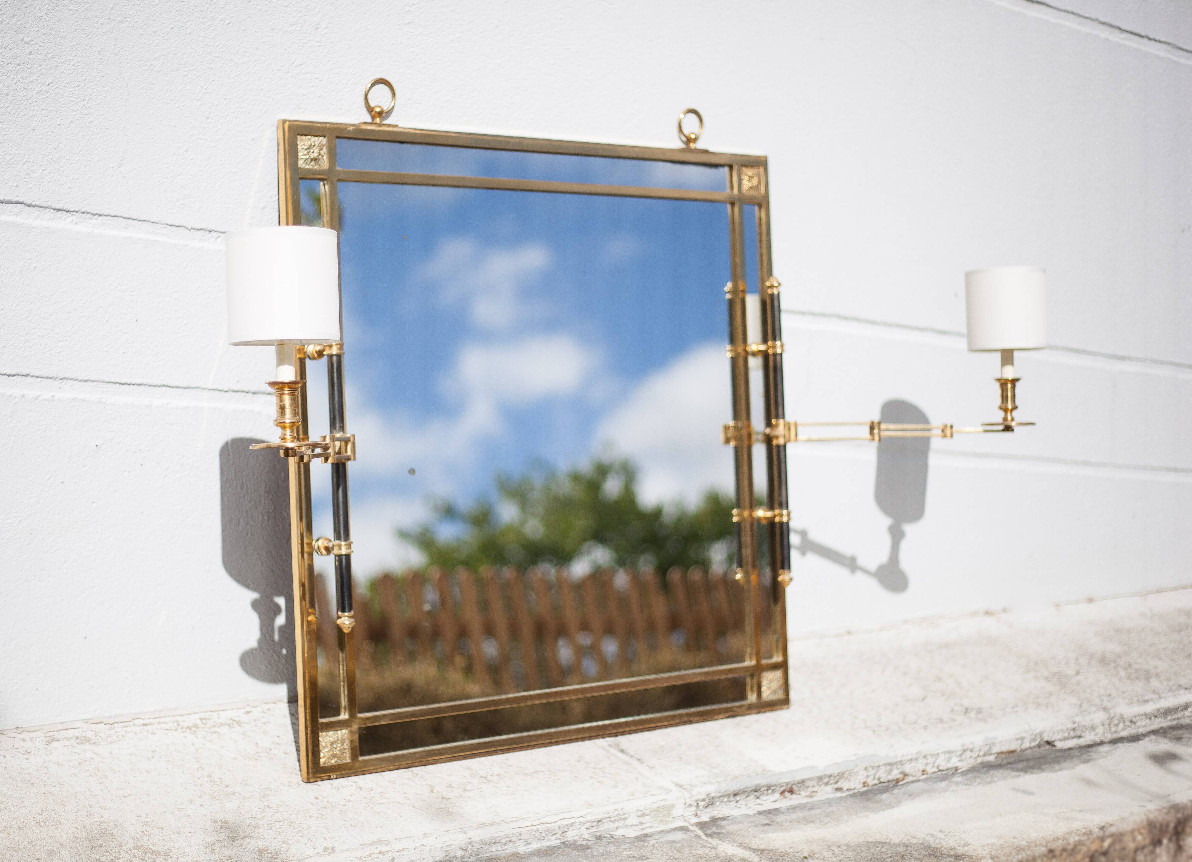 mirror with articulated wall light
