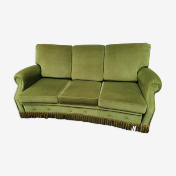 Convertible green velvet sofa
