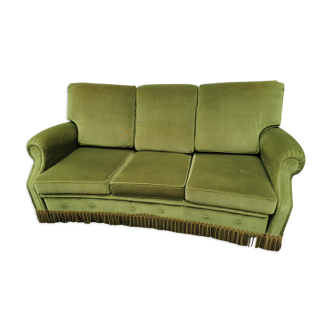 Convertible green velvet sofa