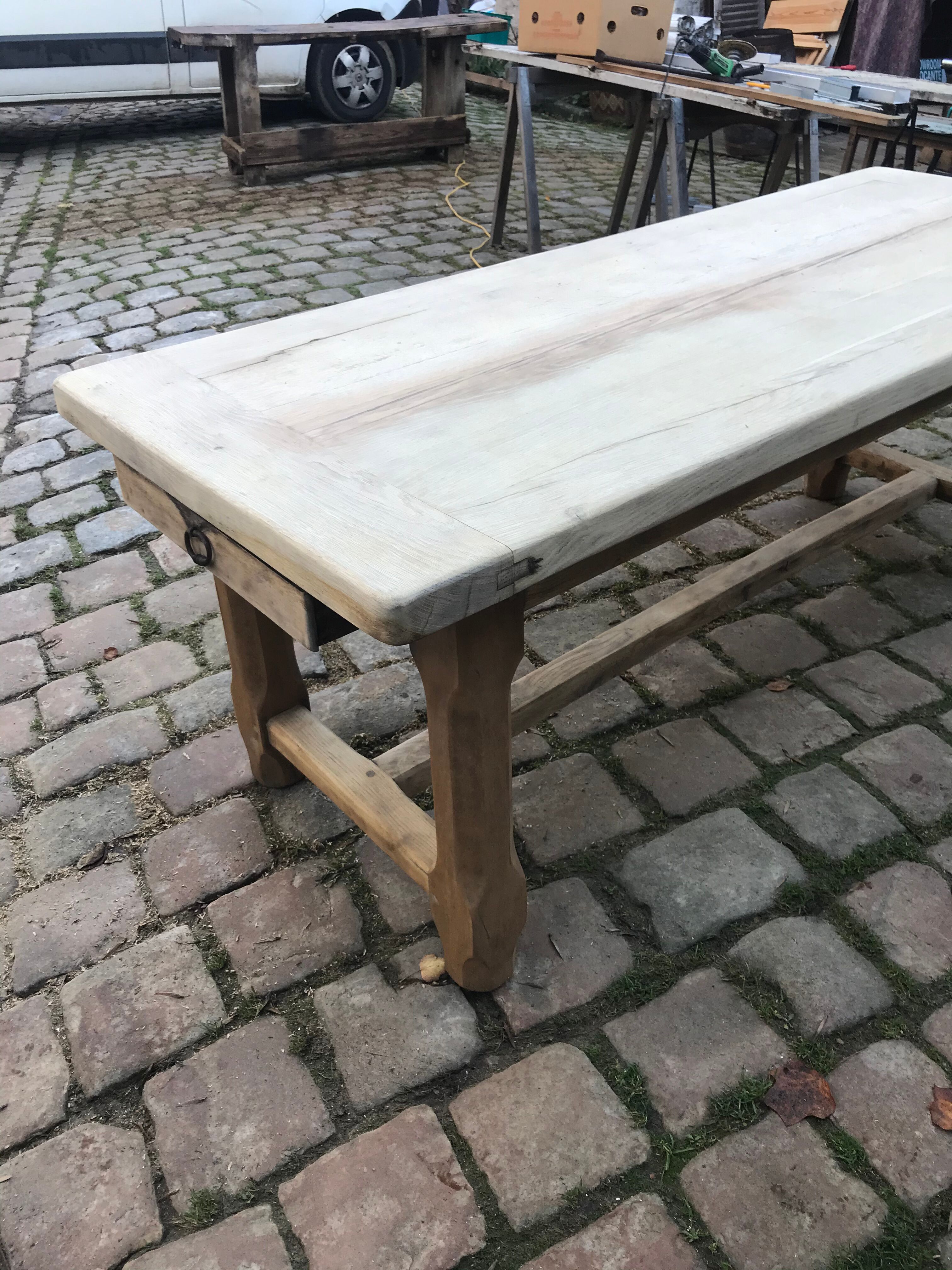 Lightened rustic stripped oak table