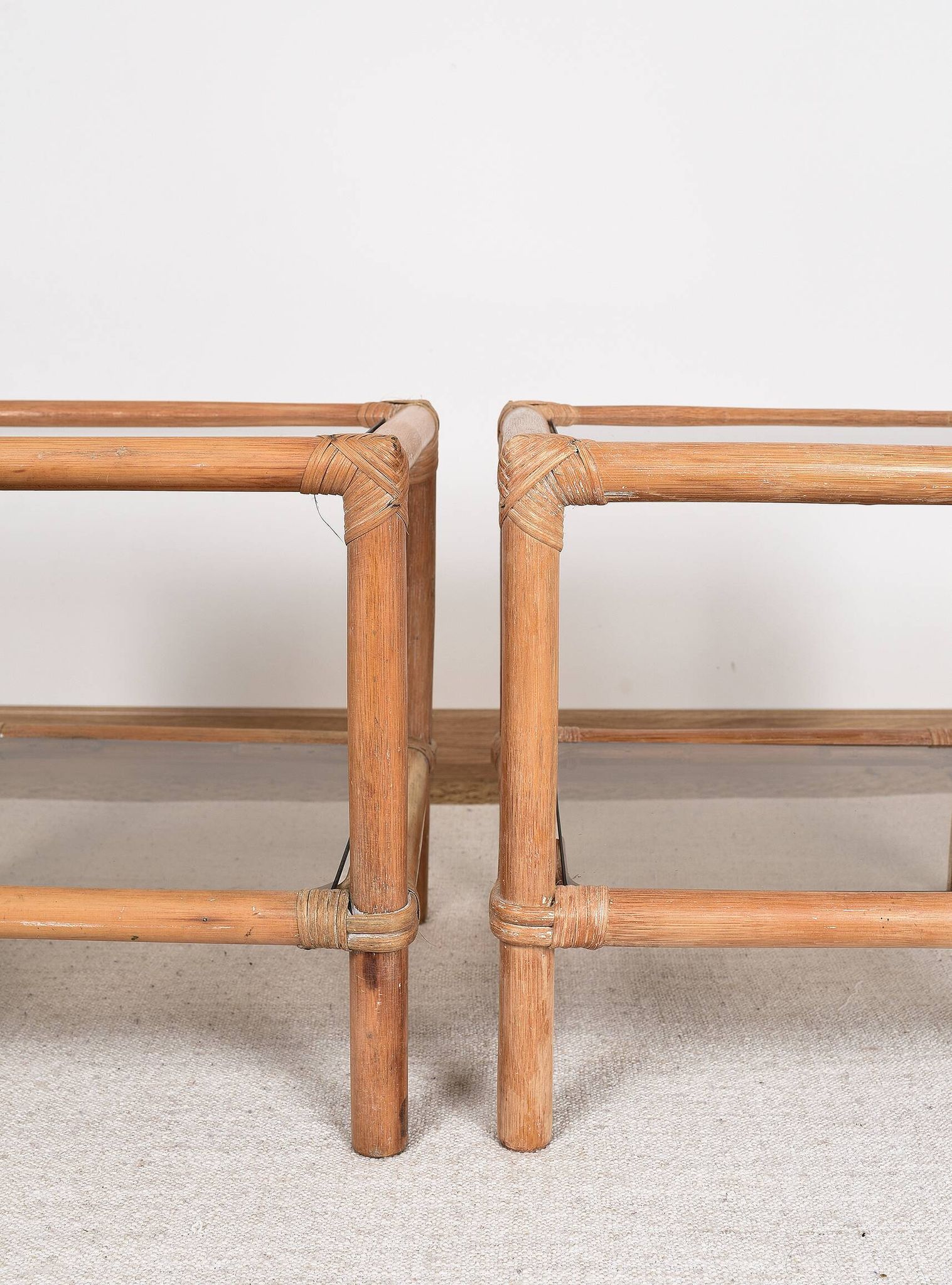 Pair of bedside tables or side tables, in rattan and smoked glass