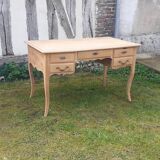 5-drawer desk with tapered legs in raw cherry wood