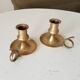 Antique hand candlestick in solid gilded brass.