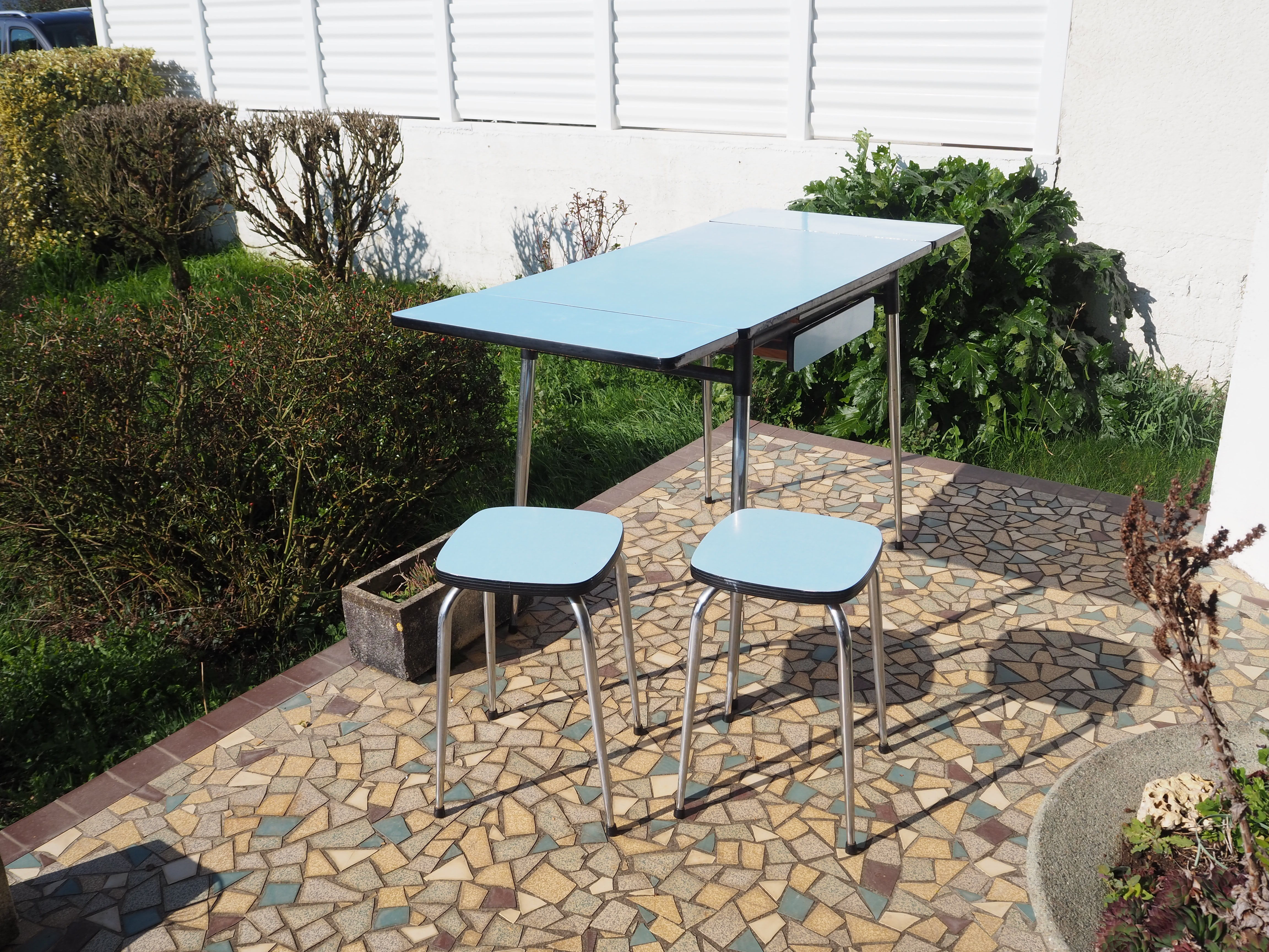 Blue formica table and two stools