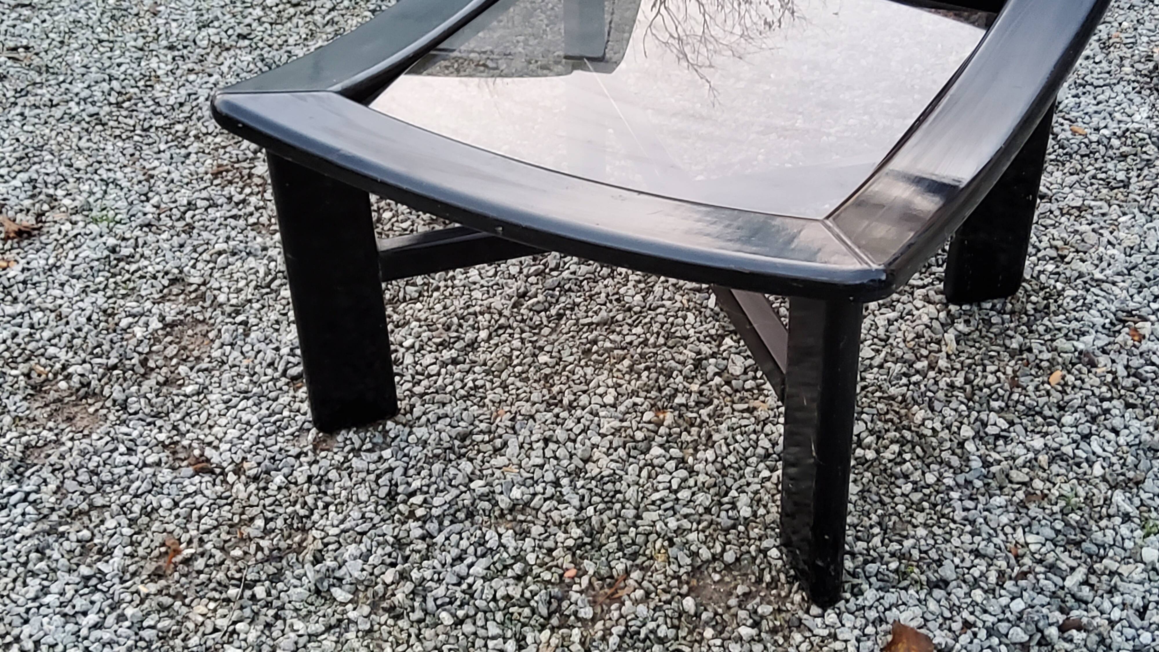 70s design coffee table in black lacquered wood with smoked glass top