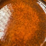 Orange glazed ceramic plates from the 1970s