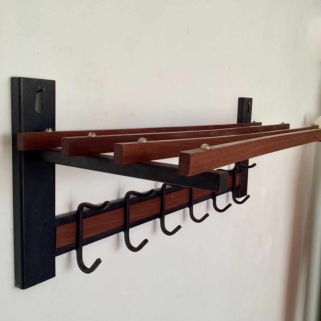 Wall-mounted coat rack