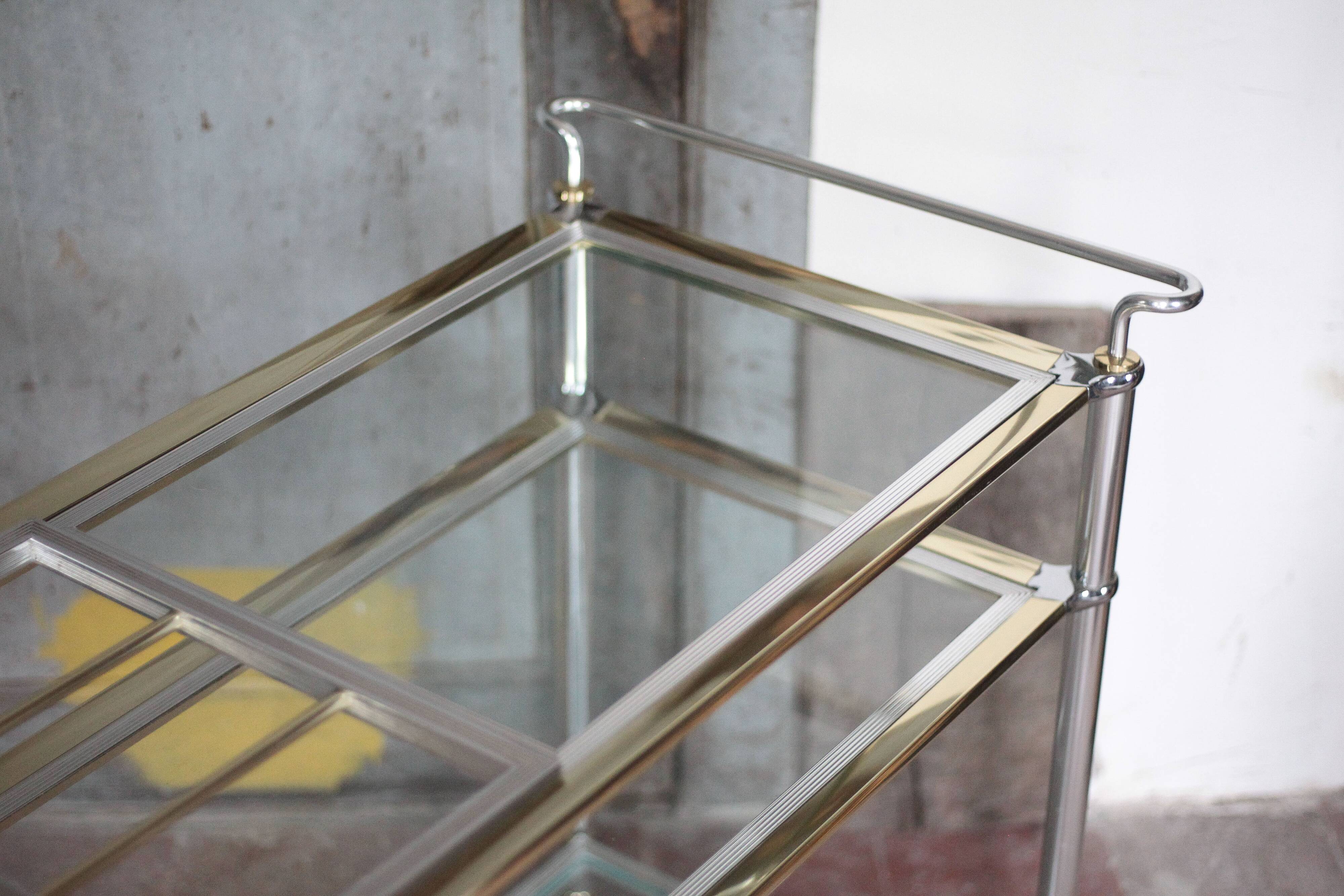 Vintage rolling dessert bar in gold metal and glass by Roche Bobois.