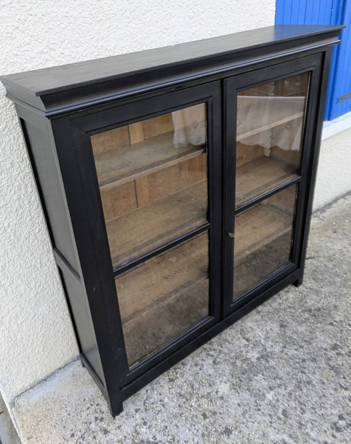 Glass display cabinet, 19th century.
