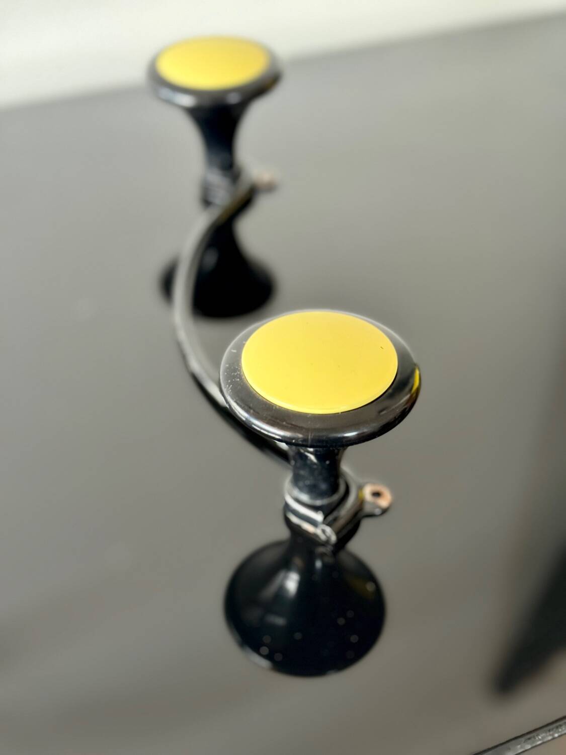 Double coat hook in yellow and black metal