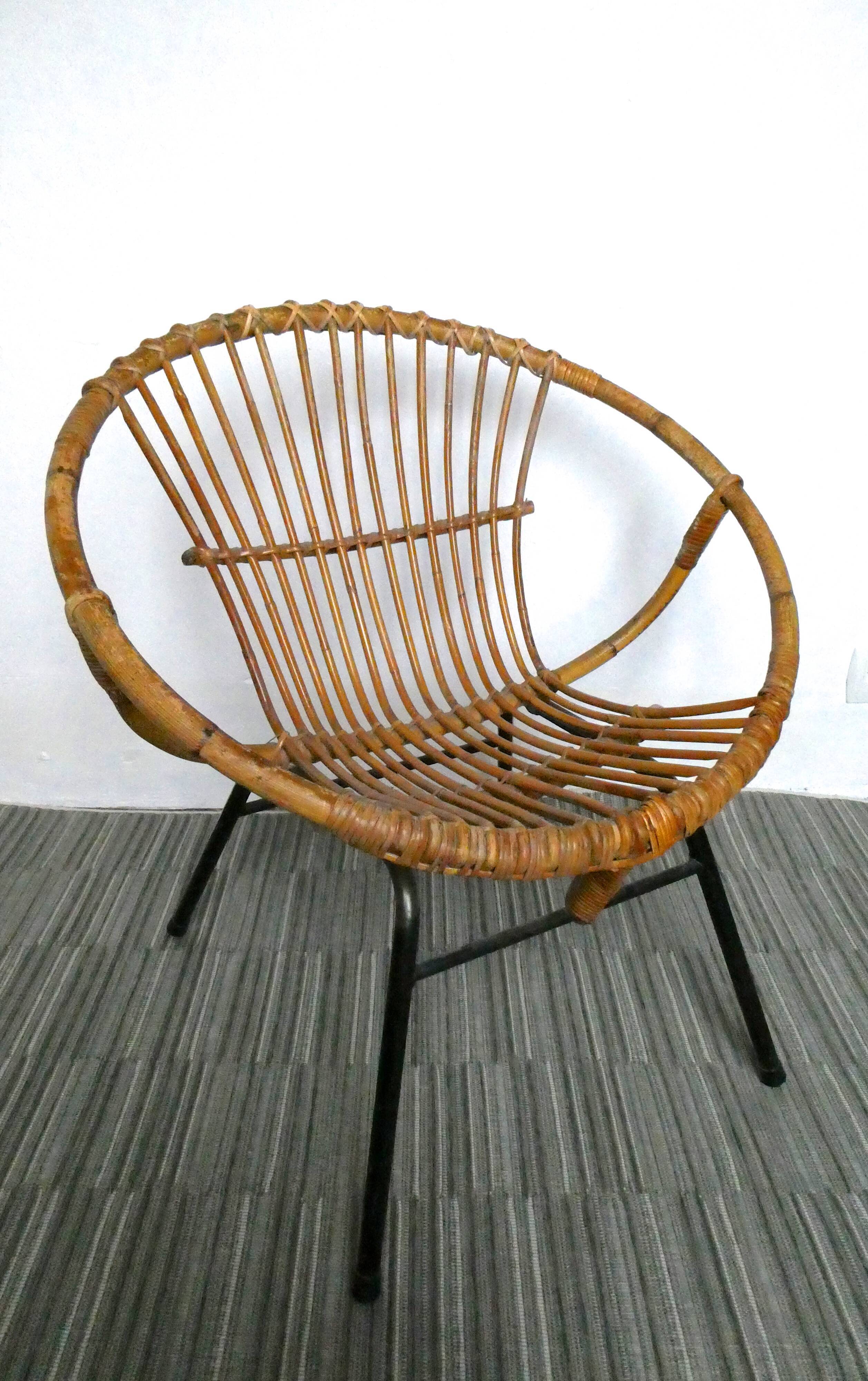 Rattan armchair and 1960s metal feet