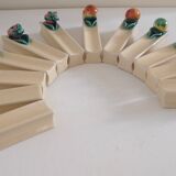 Set of 12 slip knife holders in their case