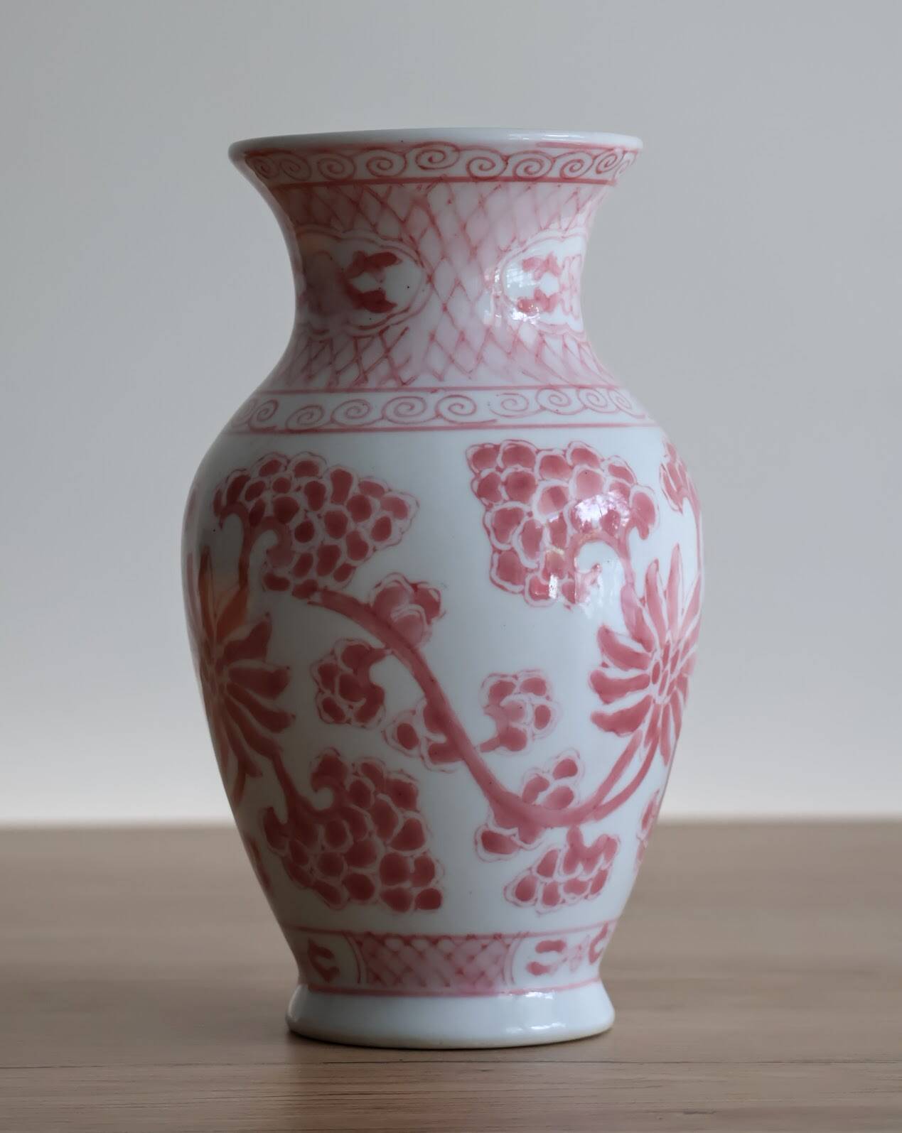 Chinese style flower vase with red and white flowers