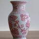 Chinese style flower vase with red and white flowers